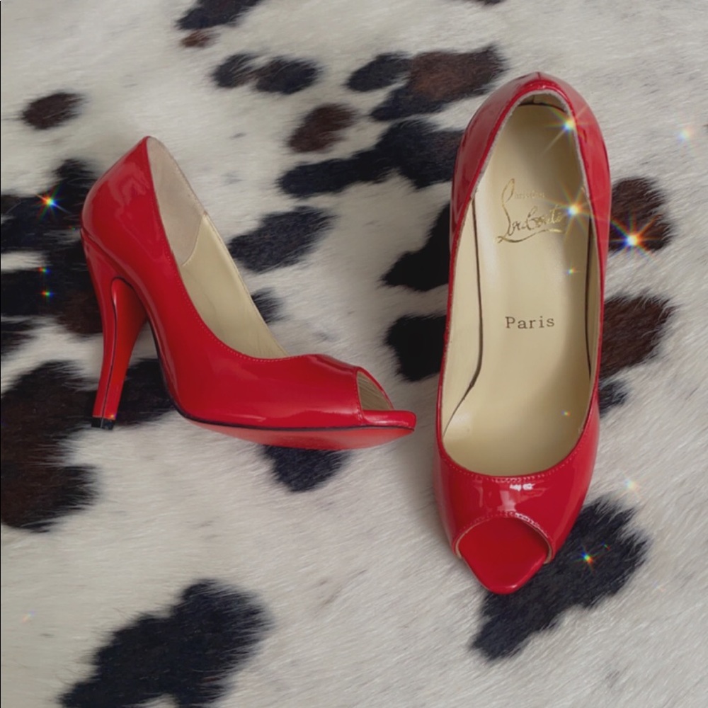 Genuine leather sole Christian Louboutin peep toe heels.